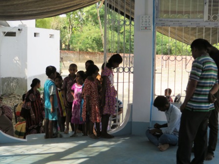 Eye clinic for village kids at Dharmada – India